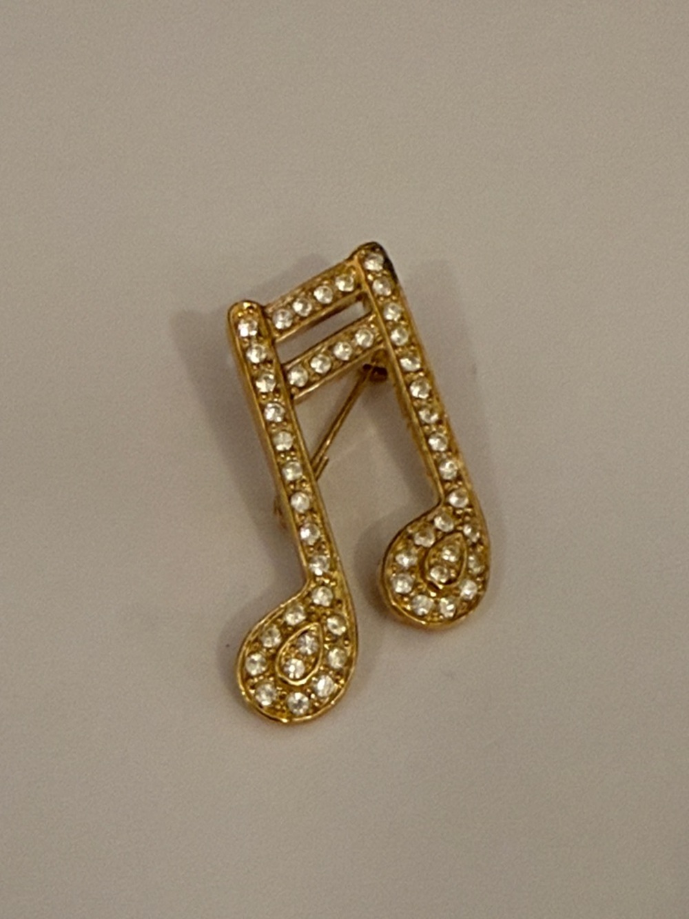 VTG ROMAN Gold Toned Musical Note brooch with Rhinestones